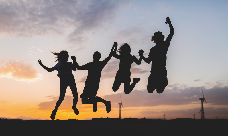 happy-friends-silhouettes-jumping-on-sunset(1).jpg